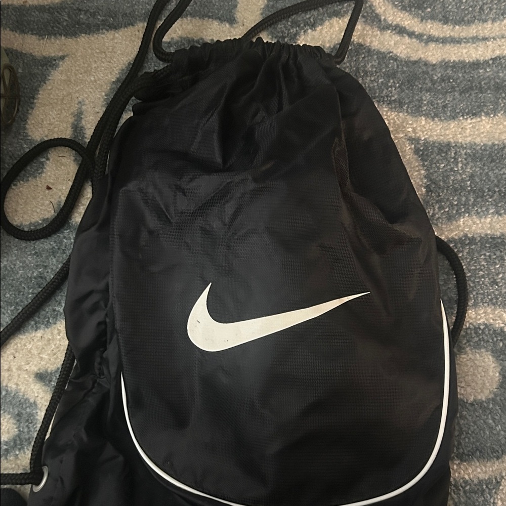 Nike Black Drawstring Backpack with White Swoosh